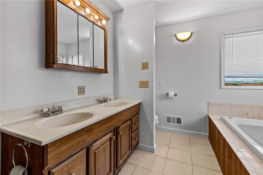 Welcome home to this exceptional 4-bedroom, 3 full bath Colonial - photo 29