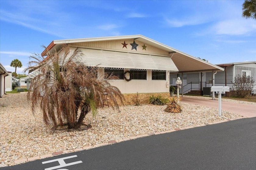 Welcome to this well-maintained 2-bedroom, 2-bath home located - photo 2