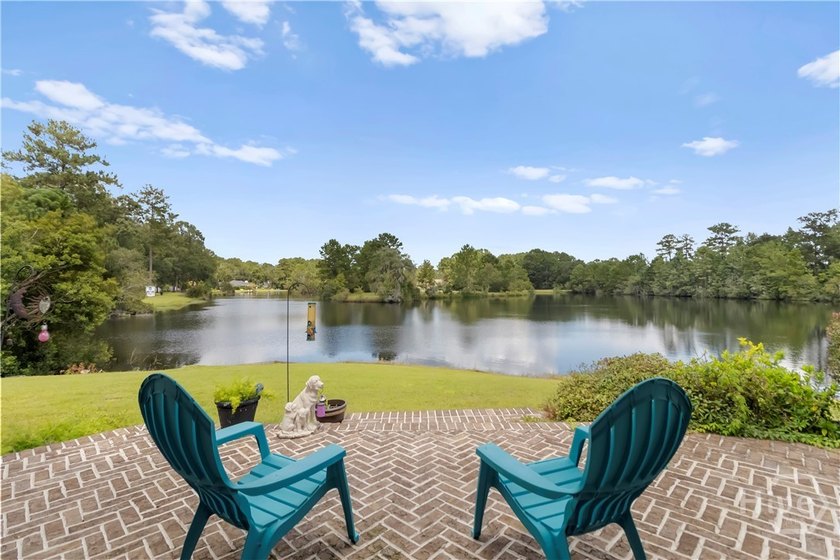 MOTIVATED SELLER! Wake up to peaceful lake views and enjoy the - photo 3