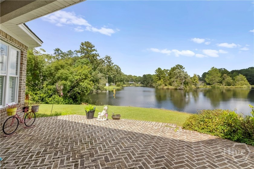 MOTIVATED SELLER! Wake up to peaceful lake views and enjoy the - photo 6