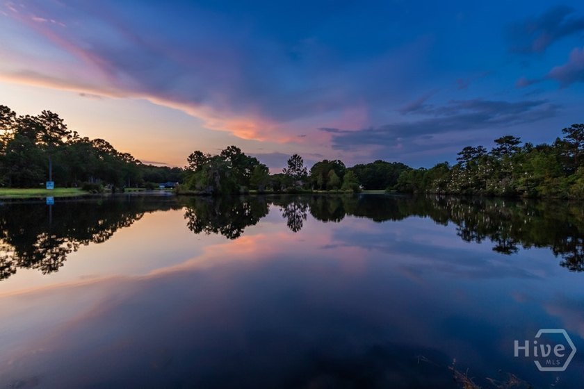 MOTIVATED SELLER! Wake up to peaceful lake views and enjoy the - photo 7