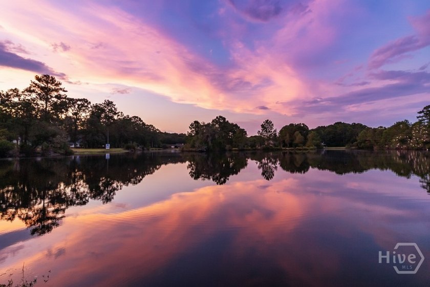 MOTIVATED SELLER! Wake up to peaceful lake views and enjoy the - photo 9