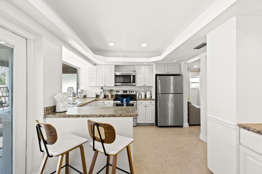 Experience waterfront living at its finest in this beautifully - photo 14