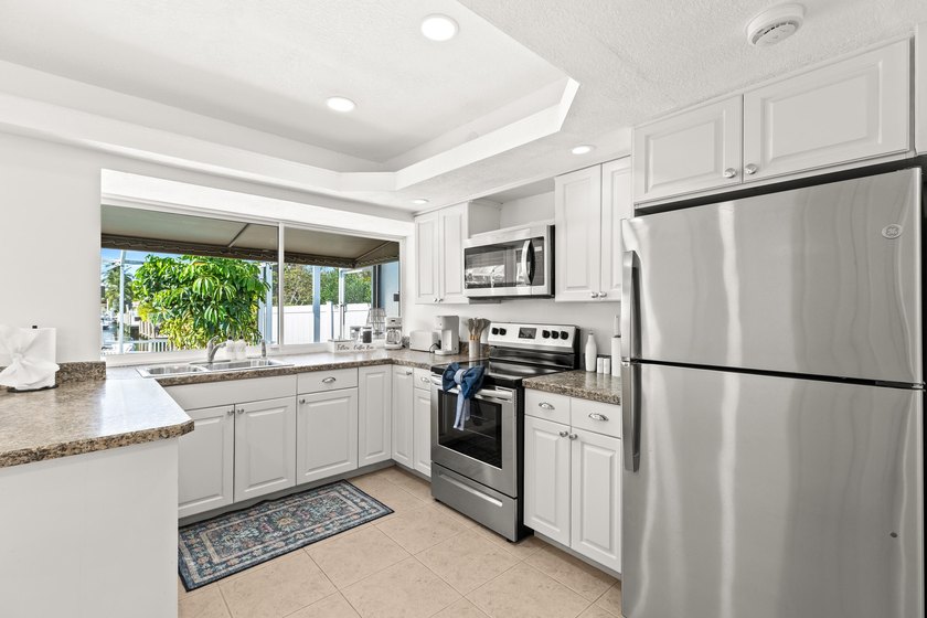 Experience waterfront living at its finest in this beautifully - photo 16