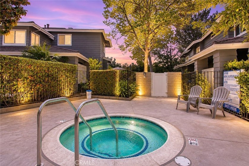 Welcome to this luxurious *Club View* townhouse nestled in an - photo 3
