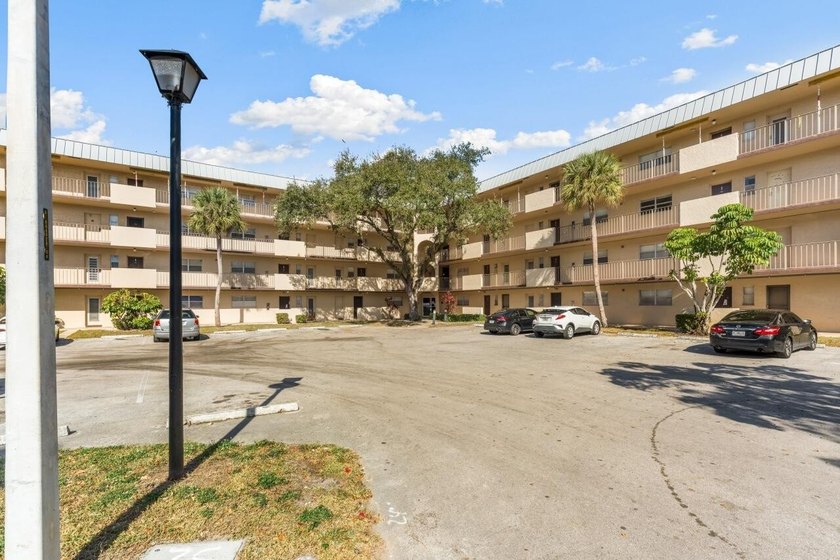 Bright 3/2 corner condo offering golf course living in Inverrary - photo 2