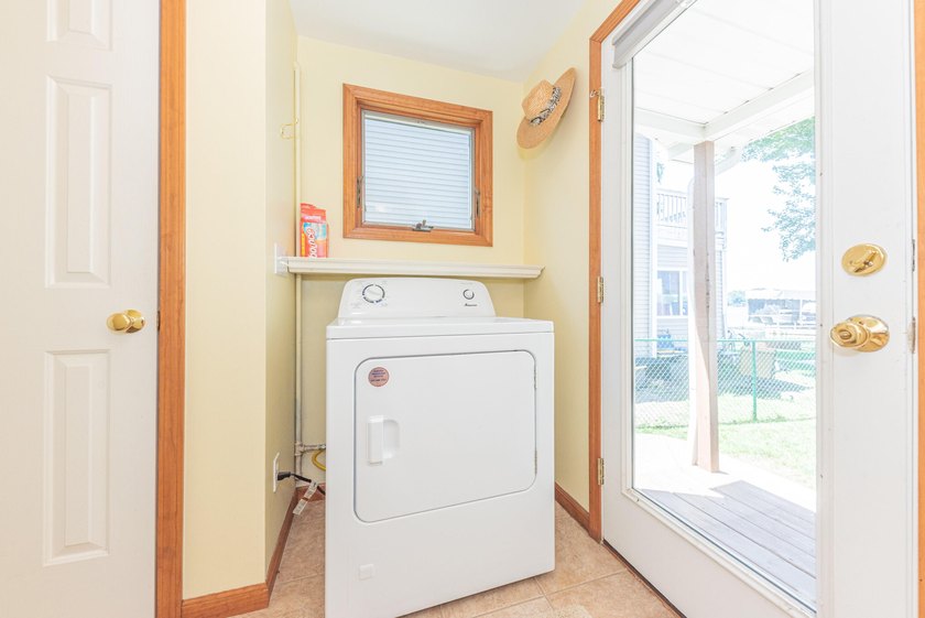 Welcome to this 3-bedroom, 2-bathroom waterfront residence in - photo 26