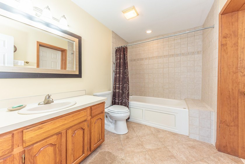 Welcome to this 3-bedroom, 2-bathroom waterfront residence in - photo 30