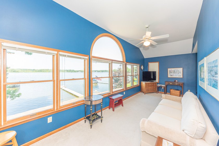 Welcome to this 3-bedroom, 2-bathroom waterfront residence in - photo 32