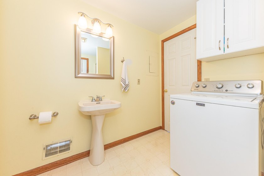 Welcome to this 3-bedroom, 2-bathroom waterfront residence in - photo 38
