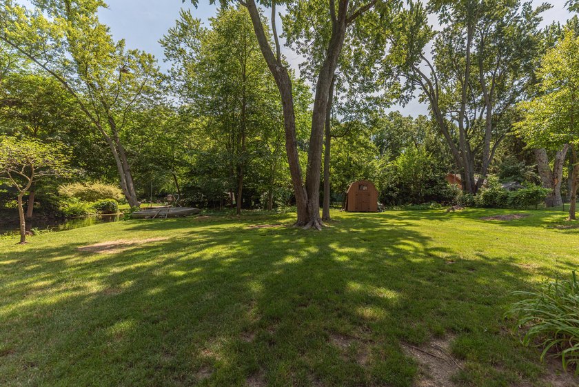 Welcome to this 3-bedroom, 2-bathroom waterfront residence in - photo 43