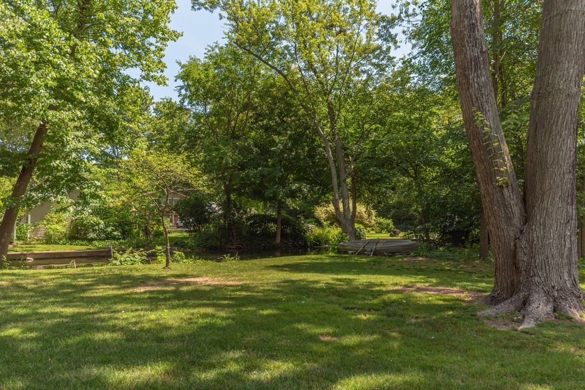 Welcome to this 3-bedroom, 2-bathroom waterfront residence in - photo 44