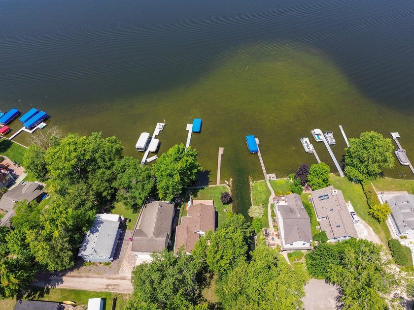 Welcome to this 3-bedroom, 2-bathroom waterfront residence in - photo 48