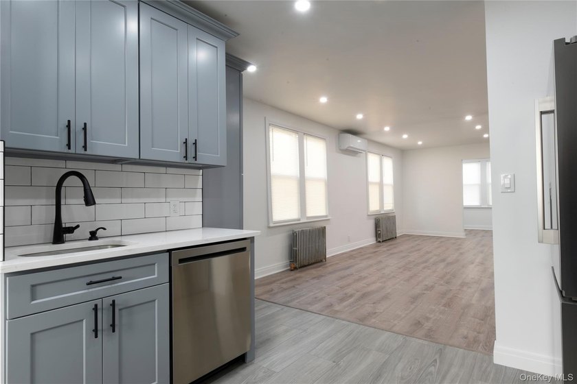 This colonial home has been extensively renovated and features a - photo 10