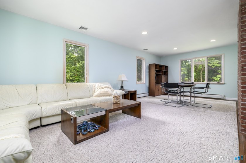 Introducing an exceptional ranch-style retreat nestled on a - photo 11