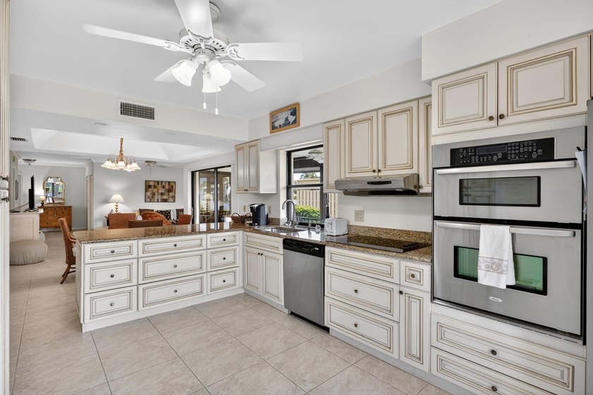 Desirable 1st floor corner unit with a beautiful lake view - photo 13