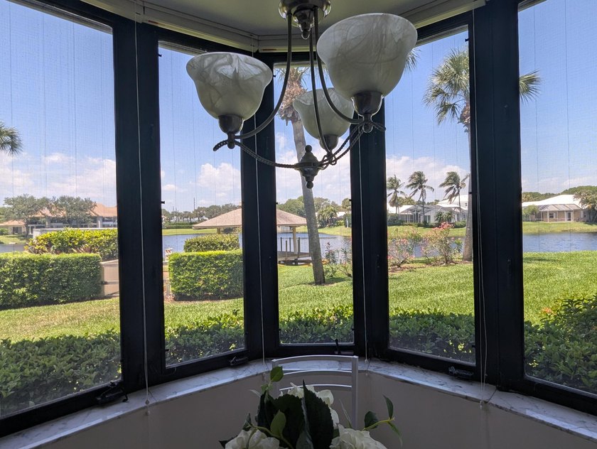 Desirable 1st floor corner unit with a beautiful lake view - photo 15