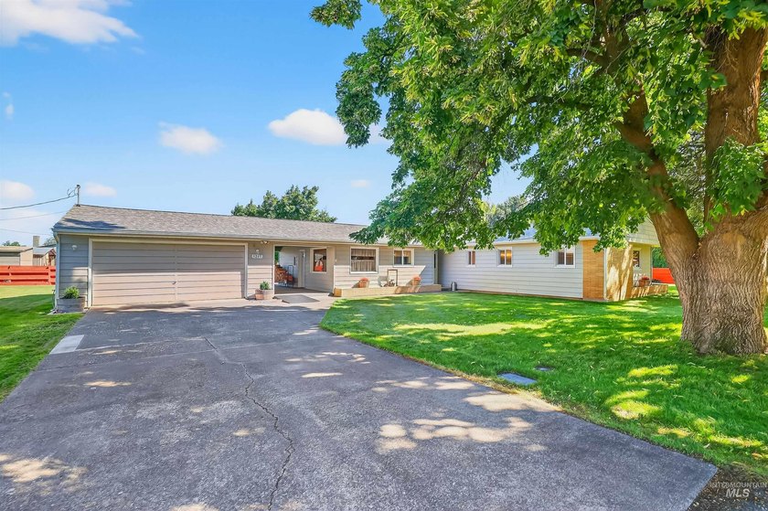 IMPROVED PRICE! This property has it all! Sitting on just under - photo 2