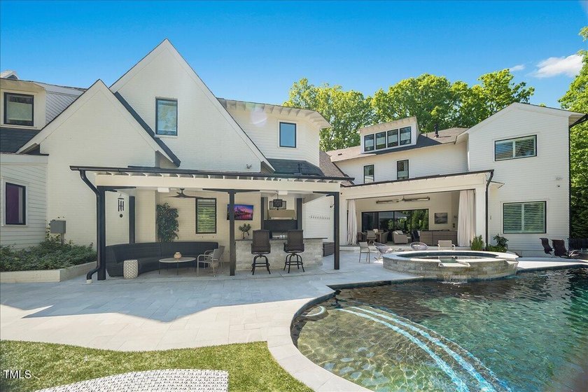 This is North Ridge's ultimate statement home, a quick stroll to - photo 3