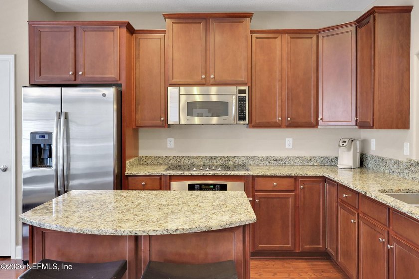 Welcome to this stunning end-unit, three-story townhouse in the - photo 22