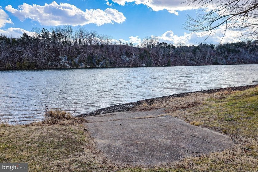 Discover the possibilities on Riverbend Drive. Tucked within a - photo 20
