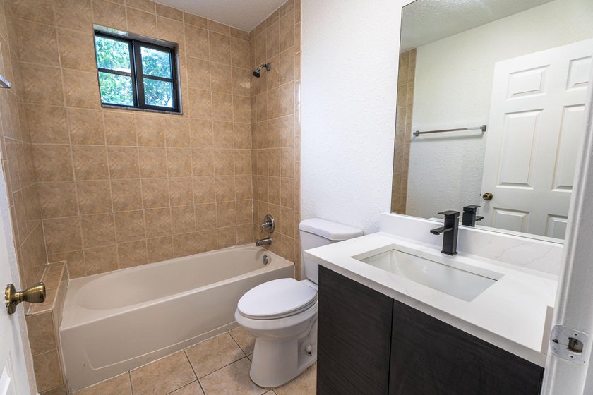 Fully remodeled apartment featuring top-of-the-line custom - photo 17