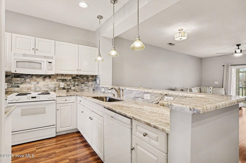 This beautifully updated condo combines comfort, style, and an - photo 10