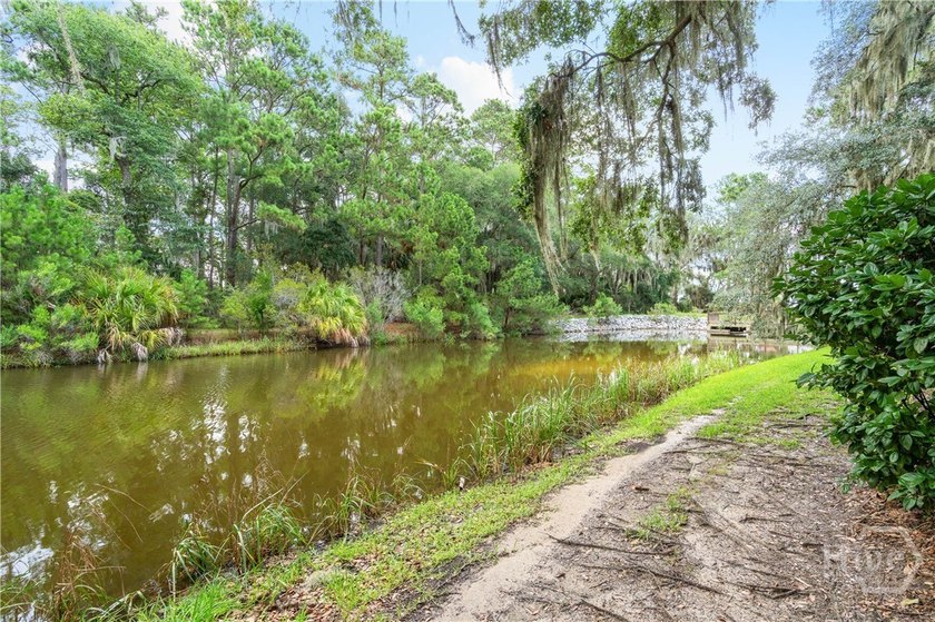 Enjoy breathtaking lagoon and river views from this beautifully - photo 3