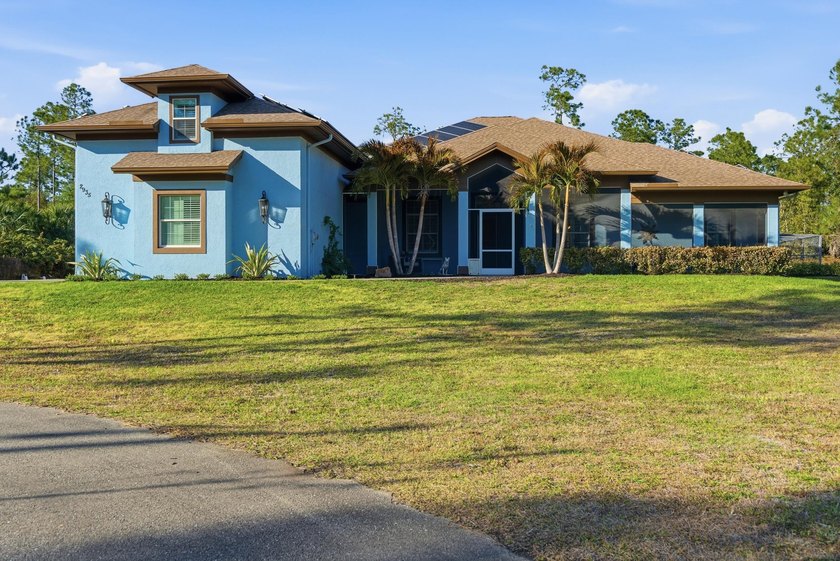 Set within the wide-open landscape of Golden Gate Estates, this - photo 2