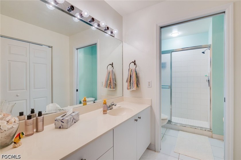 Furnished 2 bed + den condo in Parker Lakes with private views - photo 11