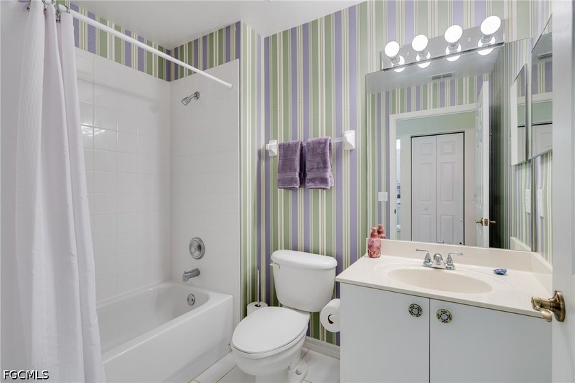 Furnished 2 bed + den condo in Parker Lakes with private views - photo 13