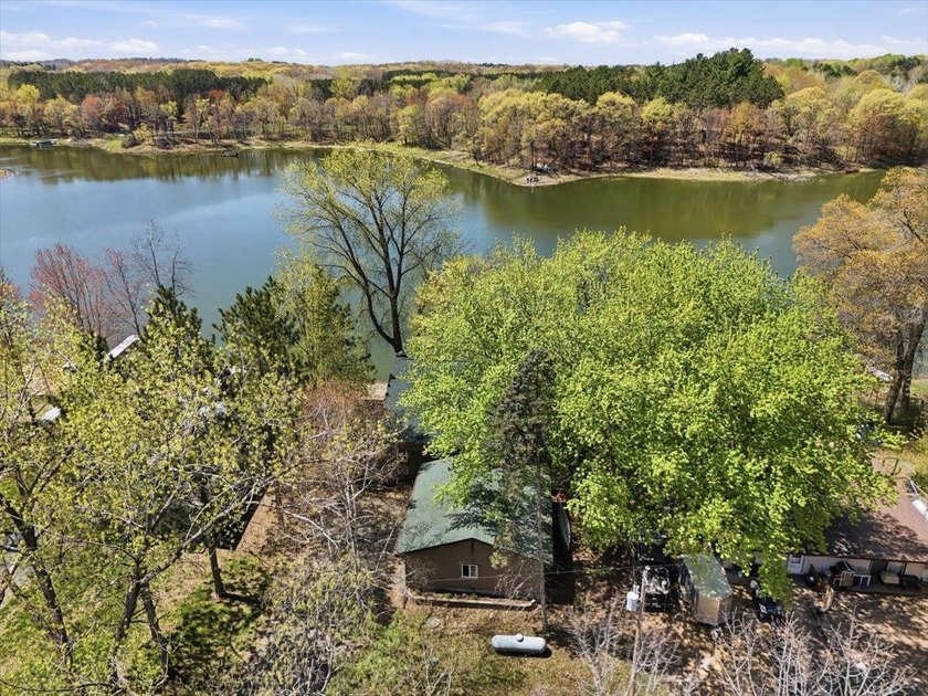 74 feet of frontage on roughly 110 acre Apple Lake, formerly - photo 2