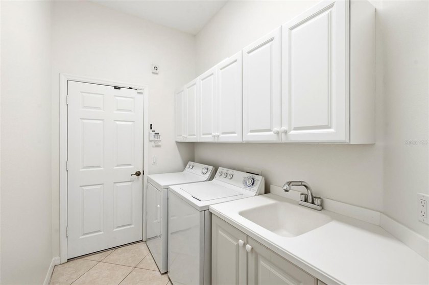 Welcome to luxury living in the prestigious Country Club at - photo 32