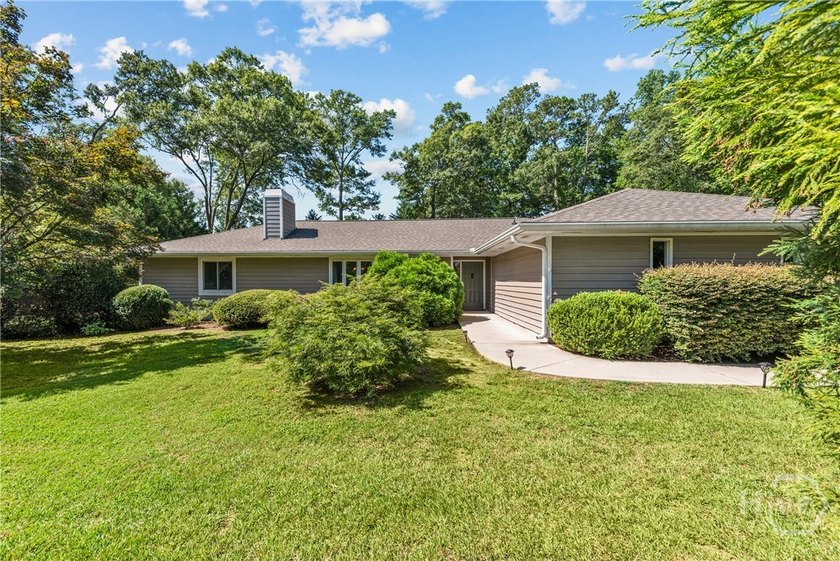 Welcome home to this beautifully remodeled 3-bedroom, 2-bath - photo 3