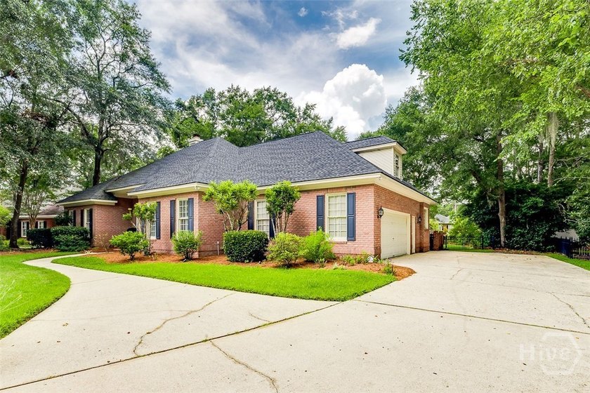 This all brick home is an inviting experience from the moment - photo 5