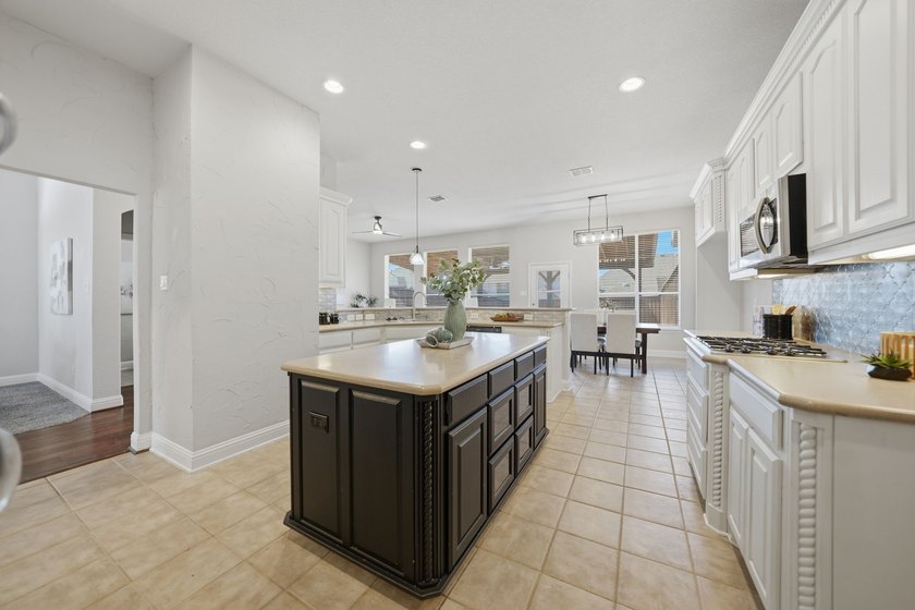 Welcome to this exceptional 4-bed, 3.5-bath home in the highly - photo 12