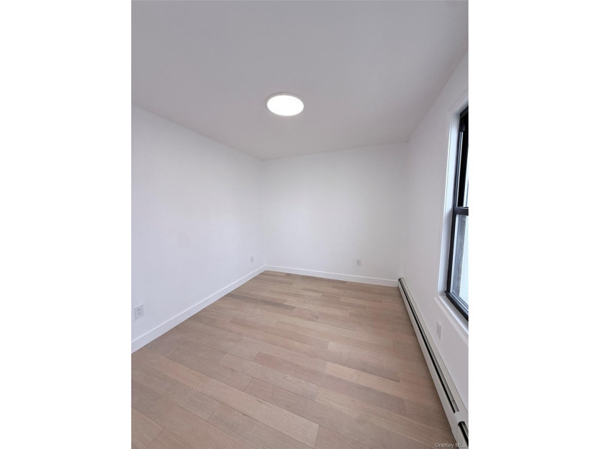 Welcome to this beautifully renovated one-family home with an - photo 13