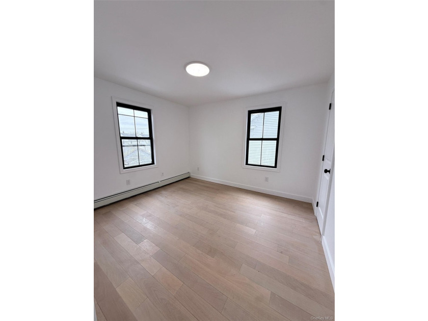Welcome to this beautifully renovated one-family home with an - photo 16