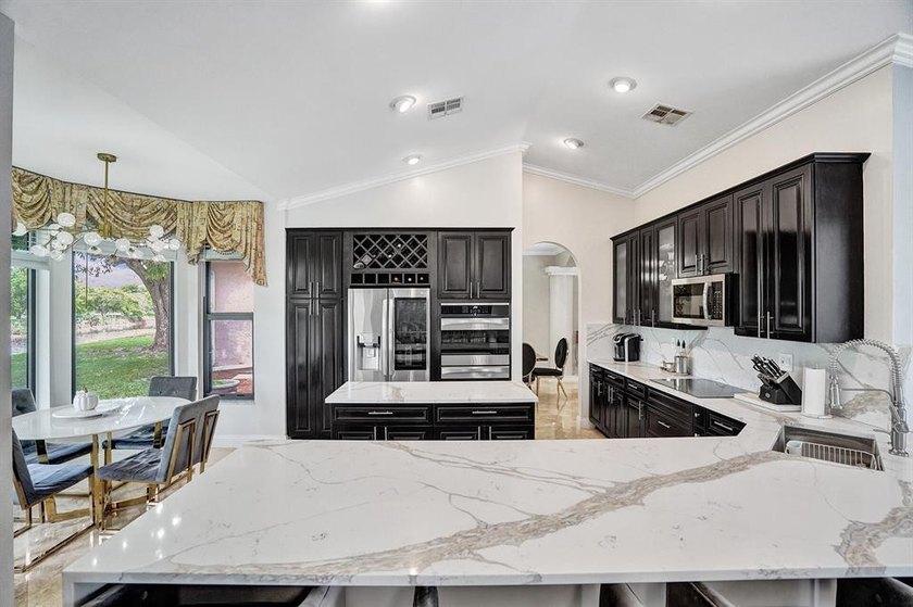 Stunning 4-bedroom home on a 1/4-acre corner lot at the end of a - photo 17