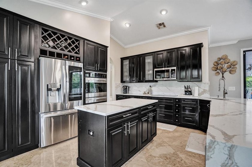 Stunning 4-bedroom home on a 1/4-acre corner lot at the end of a - photo 20