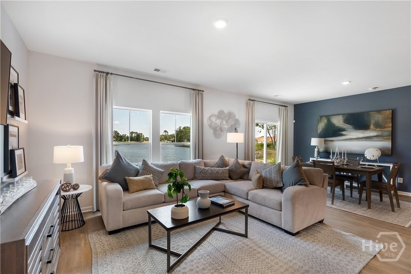 This single-story Dover home design features two bedrooms and a - photo 3