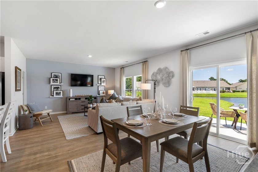 This single-story Dover home design features two bedrooms and a - photo 5