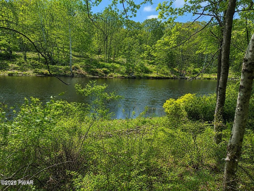 WAKE TO STUNNING RIVER VIEWS EVERY DAY! 1 acre Lot with Stunning - photo 5