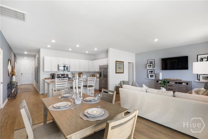 This single-story Dover home design features two bedrooms and a - photo 6