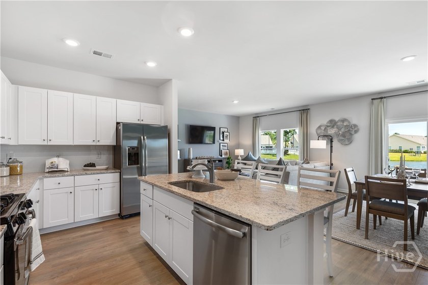 This single-story Dover home design features two bedrooms and a - photo 7