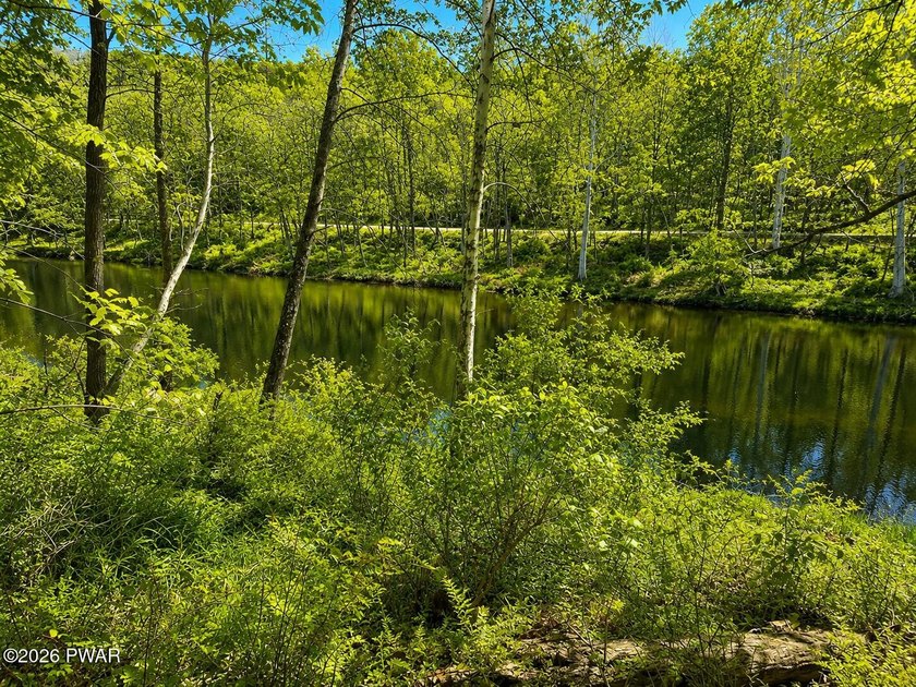 WAKE TO STUNNING RIVER VIEWS EVERY DAY! 1 acre Lot with Stunning - photo 7