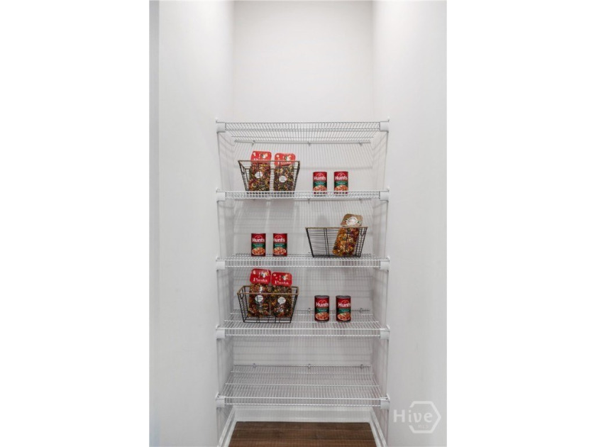 This single-story Dover home design features two bedrooms and a - photo 10