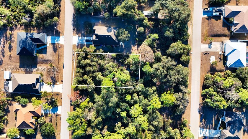 Build your dream home on this 0.23-acre vacant lot located on a - photo 4