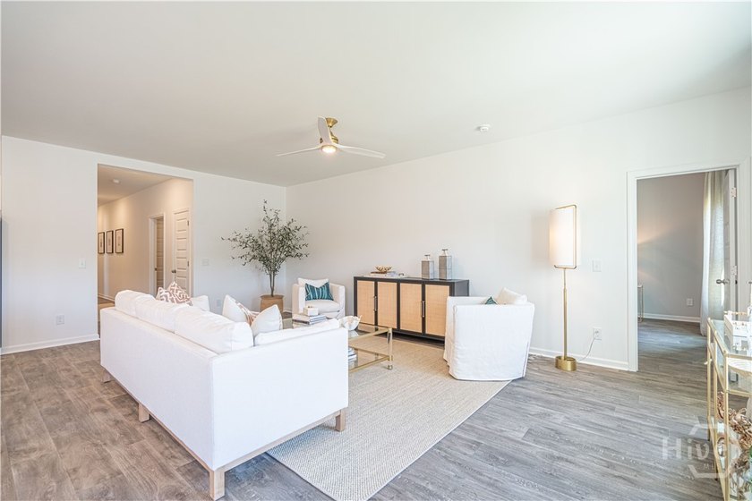 This single-story Hartford home design features an open space - photo 6