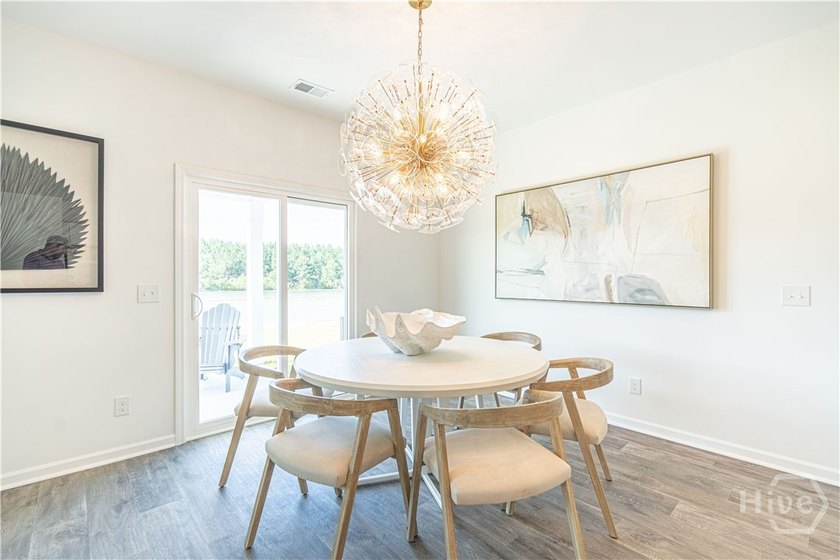 This single-story Hartford home design features an open space - photo 8